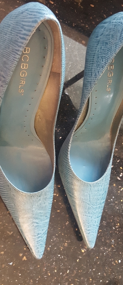 Never worn high heel pumps